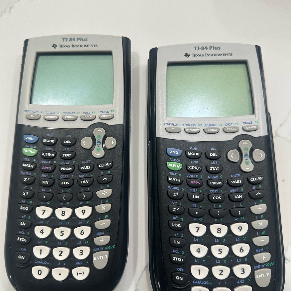 Texas Instruments TI-84 Plus Dual Graphing Calculators - Black and Silver